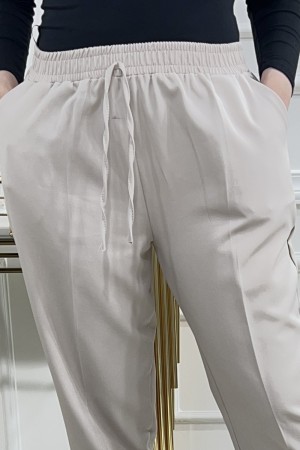 Dar Paça Beli Lastikli Dabıl Kumaş Pantolon Taş Dar Paça Beli Lastikli Dabıl Kumaş Pantolon Taş